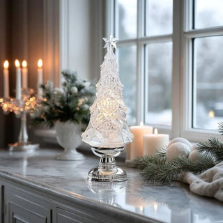 16-inch clear acrylic and silver LED Christmas tree with swirling water and glitter — elegant holiday décor centerpiece by Biggest Little Baskets.