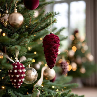 6-inch burgundy velvet pinecone ornament — elegant nature-inspired holiday décor with soft matte finish by Biggest Little Baskets.