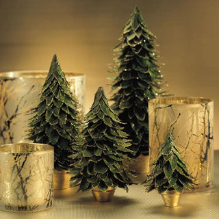 Bring winter charm indoors with this 7-inch green leaf tree accented in gold. A handcrafted, nature-inspired piece perfect for mantels and tabletops. Third & Main, Home Decor