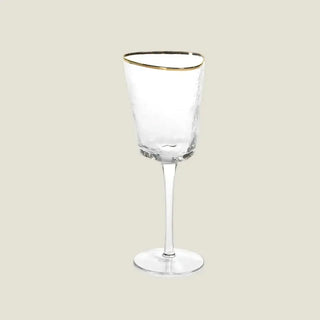 Product view of one 8.75-inch clear wine glass with a gently tapered hammered bowl, slender stem, round foot, and fine gold rim.
