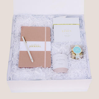 A beautifully curated Birthday Wishes Gift Box featuring a polka-dotted linen journal, a luxurious gold-accent pen, a wild rose bath truffle, birthday cake cookie bites, and a crisp white linen candle. Thoughtfully wrapped with a satin ribbon, this elegant gift box is perfect for celebrating birthdays in style.
Biggest Little Baskets, Reno Gift, Reno, Nevada Gift, Birthday Gift for Her, Birthday Gift, Gift Box, Luxury Gift Box for Her
