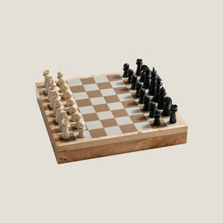 Close-up of the burl wood game board and coordinated chess and checker pieces in the 15-inch keepsake gift set.