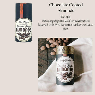 Dark chocolate-coated California almonds in their cylindrical package, a gourmet pairing in the Deluxe Sip & Savor whiskey gift box.