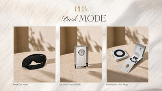 A styled product collage titled 'BLB Dark MODE' showing three minimalist dark-themed items: a black loop eye mask, a silver crystal clock, and a pair of black ear plugs in a white box. The products are arranged on a beige stone-like surface with soft shadow patterns.