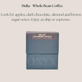 Decaf Colombia Huila whole-bean coffee option for Deluxe Java Joy with apple, dark chocolate, almond, and brown sugar notes.