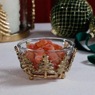 Gold and glass Christmas tree bowl filled with red candies on festive table – warm holiday tabletop decor