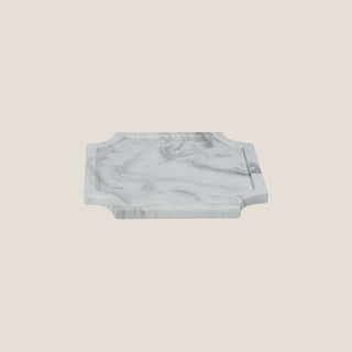 Product view of the medium Volakas marble tray, measuring 10.25 inches square and 0.5 inches high, with a satin finish, gray veining, and inward-curving corners.