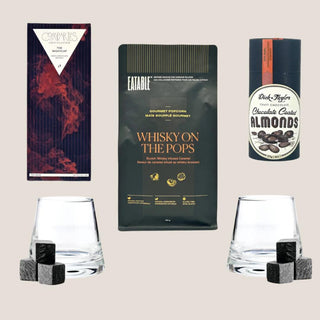 A premium gift box titled "Sip & Savor Sidekicks," featuring curated treats including gourmet whiskey-infused caramel popcorn, artisan dark chocolate, chocolate-coated almonds, whiskey glasses, and reusable whiskey stones. Perfect for men who enjoy sophisticated indulgence and crafted for occasions like celebrations or relaxing moments. Ideal for gifting in Reno and beyond. Gift box for men, Whiskey gift box, Gourmet treats for men, Whiskey stones and glasses
Gifts for men Reno, Luxury gift box Reno