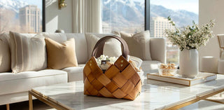Woven brown basket from biggest little baskets sitting on a coffee table in a modern living room with large windows  overlooking reno nevada.