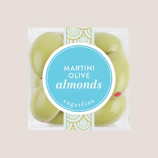 Clear package of green martini olive chocolate-covered almonds with a turquoise label.