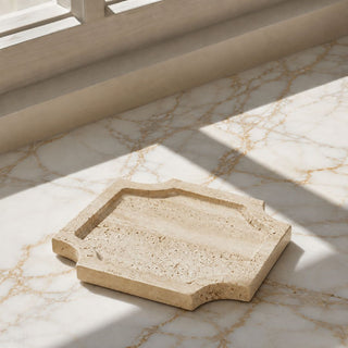 Small travertine stone tray with warm natural texture, included in the Welcome Home New Home Gift Box Level 1 for housewarming and closing gifts.