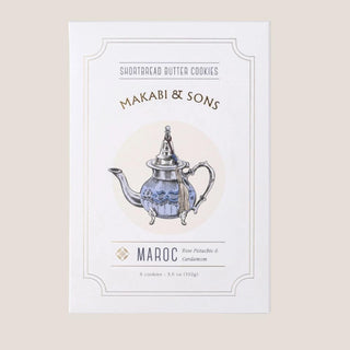 Makabi & Sons rose, pistachio, and cardamom shortbread butter cookies in an illustrated package.