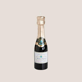 7.75-inch wax champagne bottle candle shown upright, an unscented mini candle for gift boxes and celebration gifts.